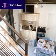 Compact kitchenette woodenwith swing doors