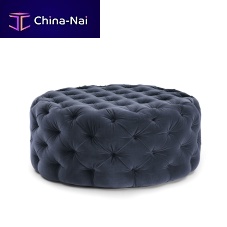 Chesterfield ottoman Selenefabricroundindoor