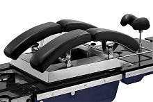 Operating table abdominal support